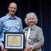 Matthew Cooper receiving award